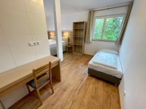 Letto o letti in una camera di Transit Rooms - Your Stopover