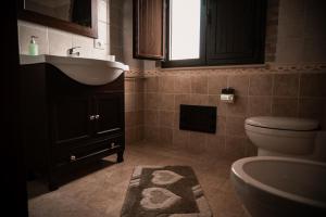 Koupelna v ubytování Agriturismo L'Antico Casale + 36 fotografií