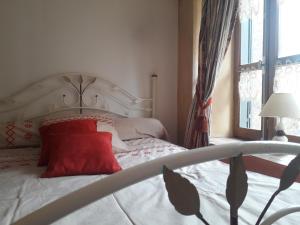 Postel nebo postele na pokoji v ubytování Gîte Roc Suzadou