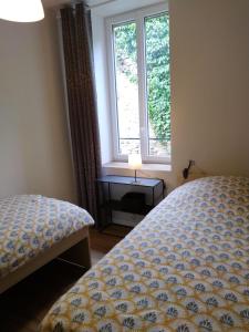 Letto o letti in una camera di Le Pigalle