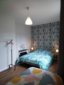 Letto o letti in una camera di Le Pigalle