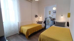 Posteľ alebo postele v izbe v ubytovaní Rooms Diana