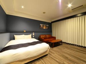 Voodi või voodid majutusasutuse LC Goryokaku Hotel toas