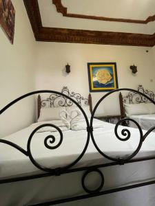 Ein Bett oder Betten in einem Zimmer der Unterkunft Lala Zohra