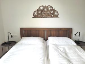 Postel nebo postele na pokoji v ubytování Apartmány U stezek