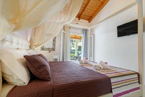 Ένα ή περισσότερα κρεβάτια σε δωμάτιο στο Palapart Gikas House +18 φωτογραφίες