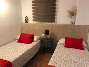 Postel nebo postele na pokoji v ubytování Casas El Molino