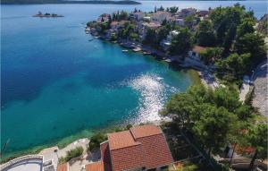 an aerial view of a beach with boats in the water at Stunning Home In Klek With Sauna in Klek +45 photos
