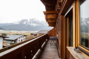 a balcony with a view of a mountain at Appartementhaus Untere Tanne in Lermoos