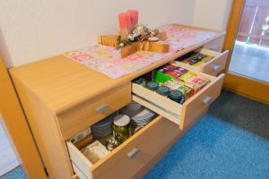 a childs play table with openartments in a room at Appartementhaus Untere Tanne in Lermoos