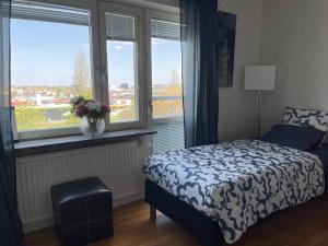Postel nebo postele na pokoji v ubytování Twayi Luxury Suites