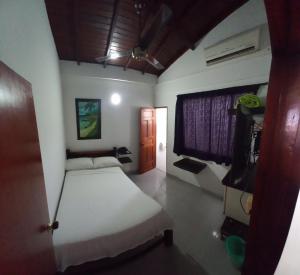 Postel nebo postele na pokoji v ubytování HOTEL SAN ADOLFO