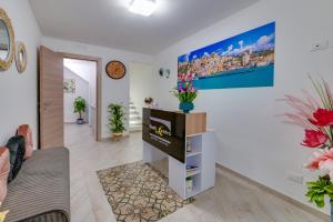 TV a/nebo společenská místnost v ubytování NottInCentro -Guest House-