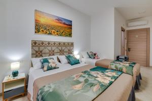 Postel nebo postele na pokoji v ubytování NottInCentro -Guest House-