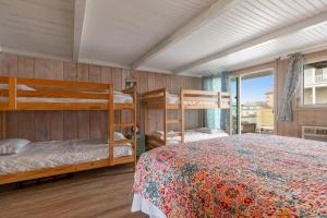 Ένα ή περισσότερα κρεβάτια σε δωμάτιο στο Beach Village 6