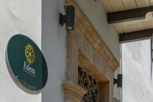 a sign on the side of a building at Edem Traditional House in Larnaka