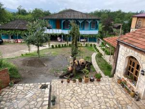 Vrt pred nastanitvijo Odo’s Guest House