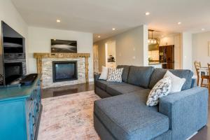 a living room with a couch and a fireplace at San Francisco Getaway Near Golden Gate Park in San Francisco