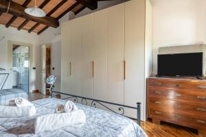 Postel nebo postele na pokoji v ubytování Casa Vecchia Rooms and Parking