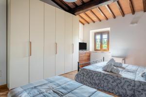 Postel nebo postele na pokoji v ubytování Casa Vecchia Rooms and Parking