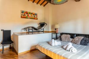 Postel nebo postele na pokoji v ubytování Casa Vecchia Rooms and Parking