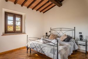 Postel nebo postele na pokoji v ubytování Casa Vecchia Rooms and Parking