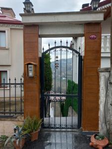 an entrance to a gate to a house at Villa trabzon in Çağlayan