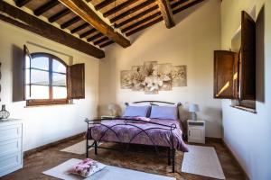 Agriturismo Val di Tufo客房内的一张或多张床位