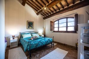 Agriturismo Val di Tufo客房内的一张或多张床位