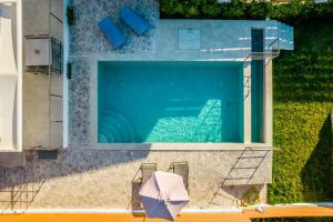 Gallery image of Elianthos Luxury Villas in Tsoukaladhes