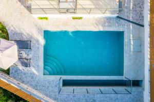 Gallery image of Elianthos Luxury Villas in Tsoukaladhes