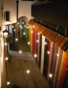 a hallway with lights on the side of a building at Casa Yuri in Salta