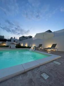 Swimmingpoolen hos eller tæt på L’Arte di Vittorio Bed and Breakfast