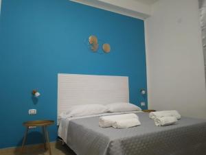 Postel nebo postele na pokoji v ubytování COSTA BRAVA Guest House - Affittacamere + 21 fotografií