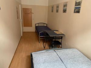 Postel nebo postele na pokoji v ubytování Hostel EMMA