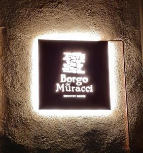 Majutusasutuses Borgo de' Muracci olev sertifikaat, autasu, silt või muu dokument