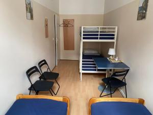 Postel nebo postele na pokoji v ubytování Hostel EMMA