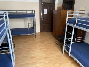 Postel nebo postele na pokoji v ubytování Hostel EMMA