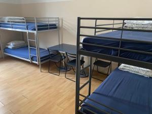 Postel nebo postele na pokoji v ubytování Hostel EMMA