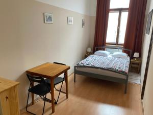 Postel nebo postele na pokoji v ubytování Hostel EMMA