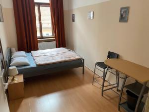 Postel nebo postele na pokoji v ubytování Hostel EMMA