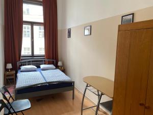 Postel nebo postele na pokoji v ubytování Hostel EMMA