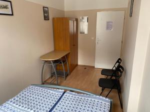 Postel nebo postele na pokoji v ubytování Hostel EMMA