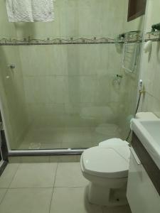 Koupelna v ubytování Recanto Suítes