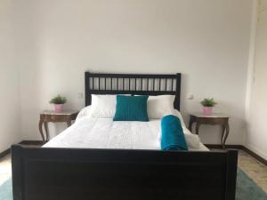 Cama o camas de una habitación en Villa Rana, con amplio jardín, barbacoa y piscina