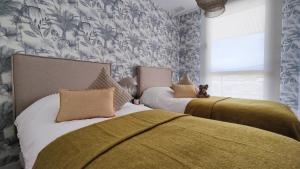 Posteľ alebo postele v izbe v ubytovaní ALLONBAY sun & beach penthouse