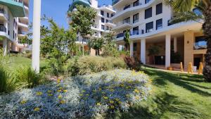 Vonkajšia záhrada v ubytovaní ALLONBAY sun & beach penthouse