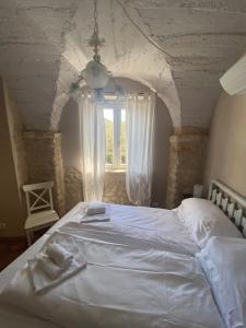 A bed or beds in a room at CASA VIRGINIA