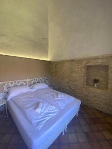 A bed or beds in a room at CASA VIRGINIA