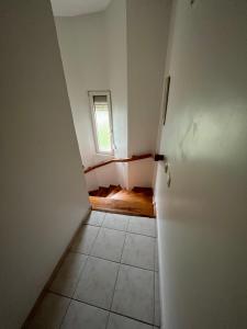 an empty room with a door and a window at A nice villa Near the city and the AirPort and the beach in Dalaman